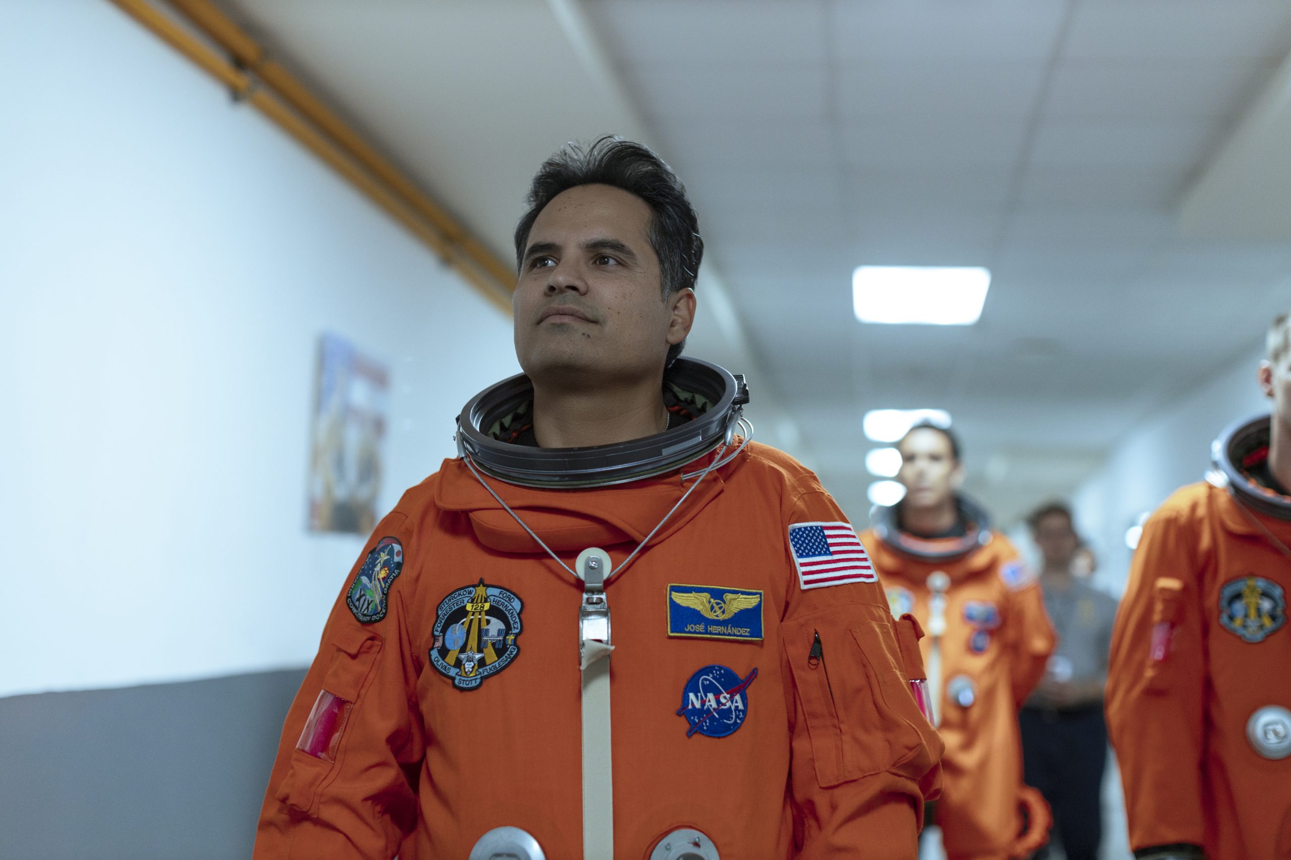 Michael Peña's as an Astronaut | A Million Miles Away Movie Review | Therapeutic Culture in A Million Miles Away